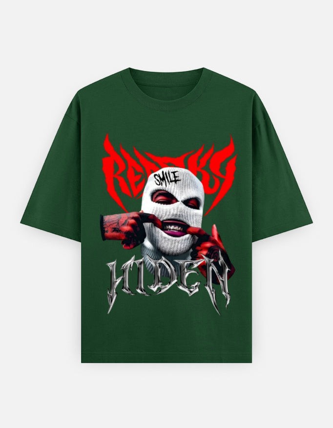 No Cap Co green 100% cotton oversized t-shirt with a graphic print of a person wearing a white balaclava and red gloves, with the word "HIDDEN" below.