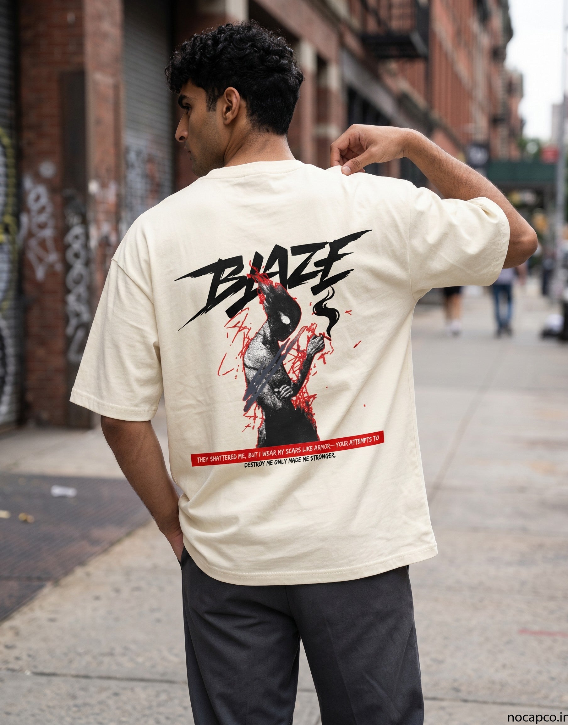 No Cap Co BALZE V2 oversized cream 100% cotton t-shirt with graphic print of a figure and text.