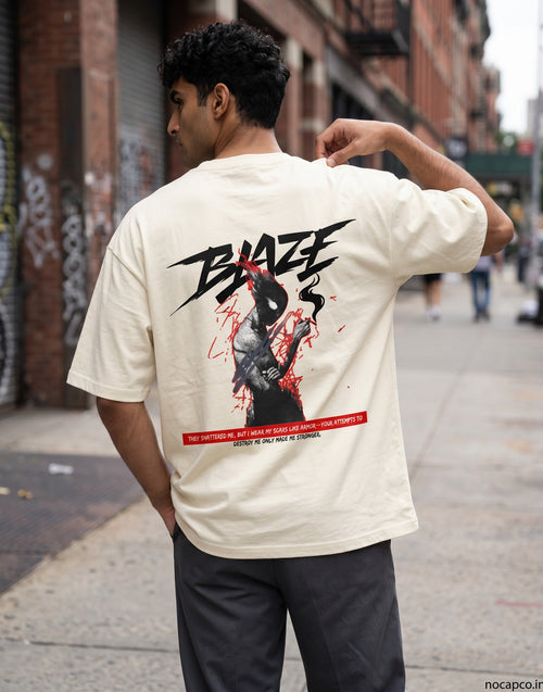 No Cap Co BALZE V2 oversized cream 100% cotton t-shirt with graphic print of a figure and text.