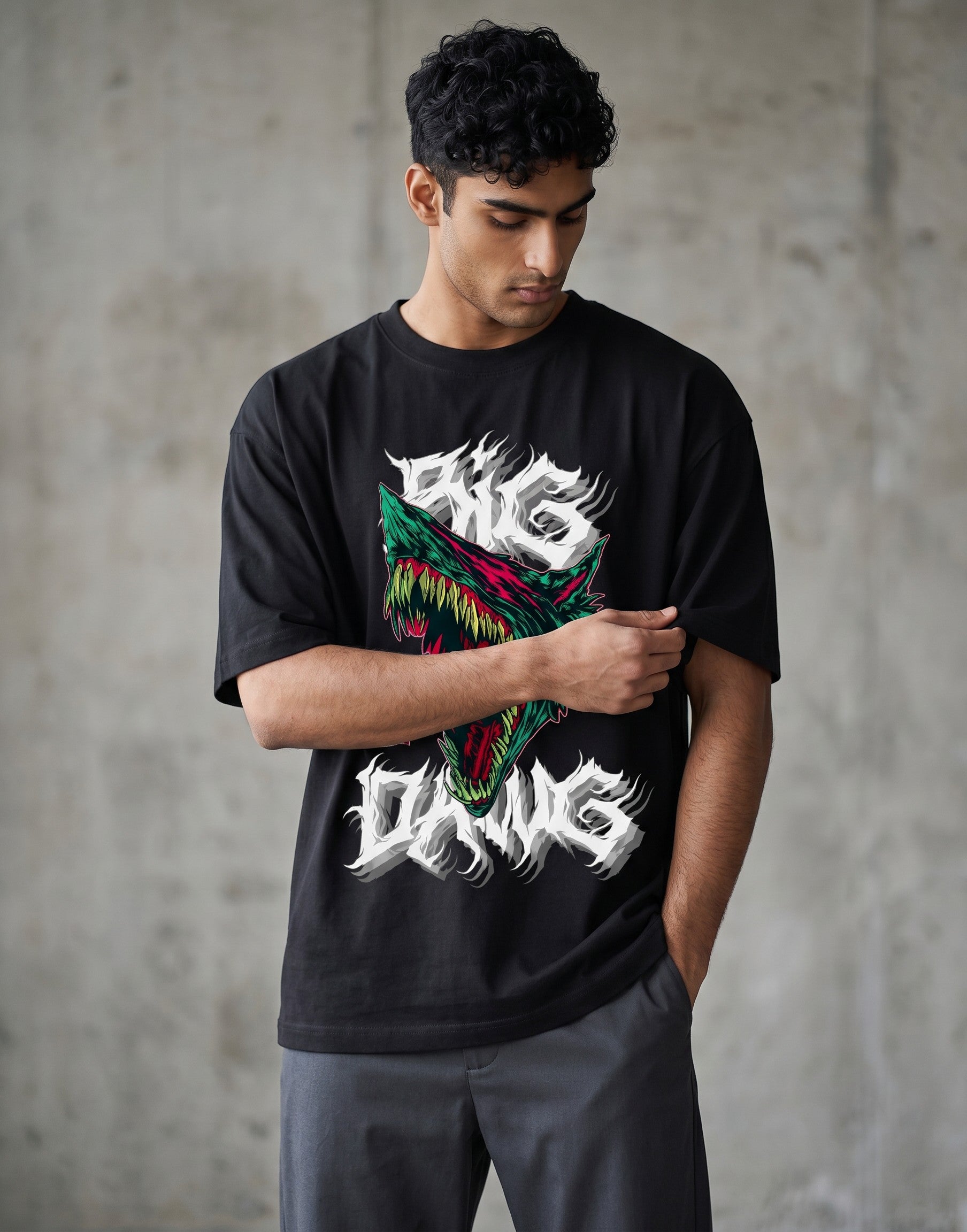 No Cap Co black oversized t-shirt with a graphic print of a snarling wolf head and the text "BIG DAWG". 100% cotton.