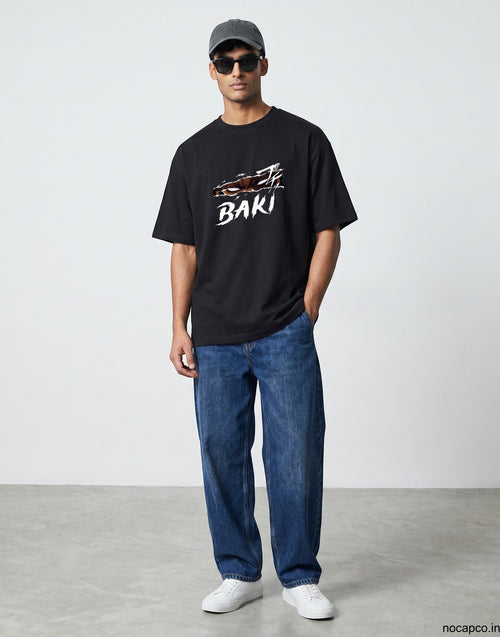 No Cap Co black 100% cotton t-shirt with white 'BAKI' graphic and ripped effect design. Unisex fit.