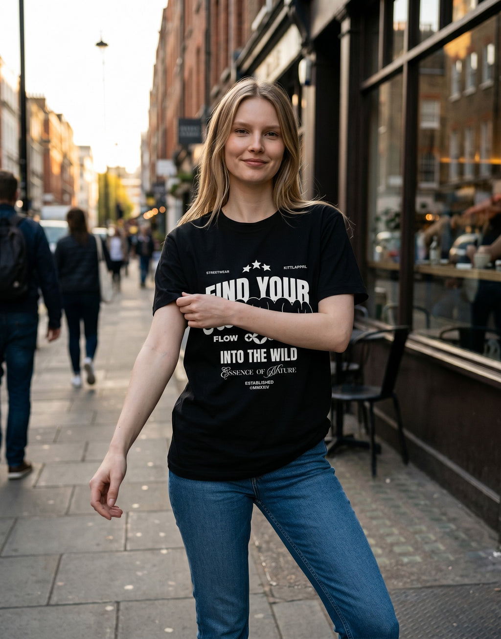 No Cap Co black 100% cotton crew neck t-shirt with "Find Your Freedom" graphic print.