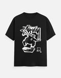 No Cap Co black 100% cotton crew neck t-shirt with a graphic print of a skateboarder mid-air.