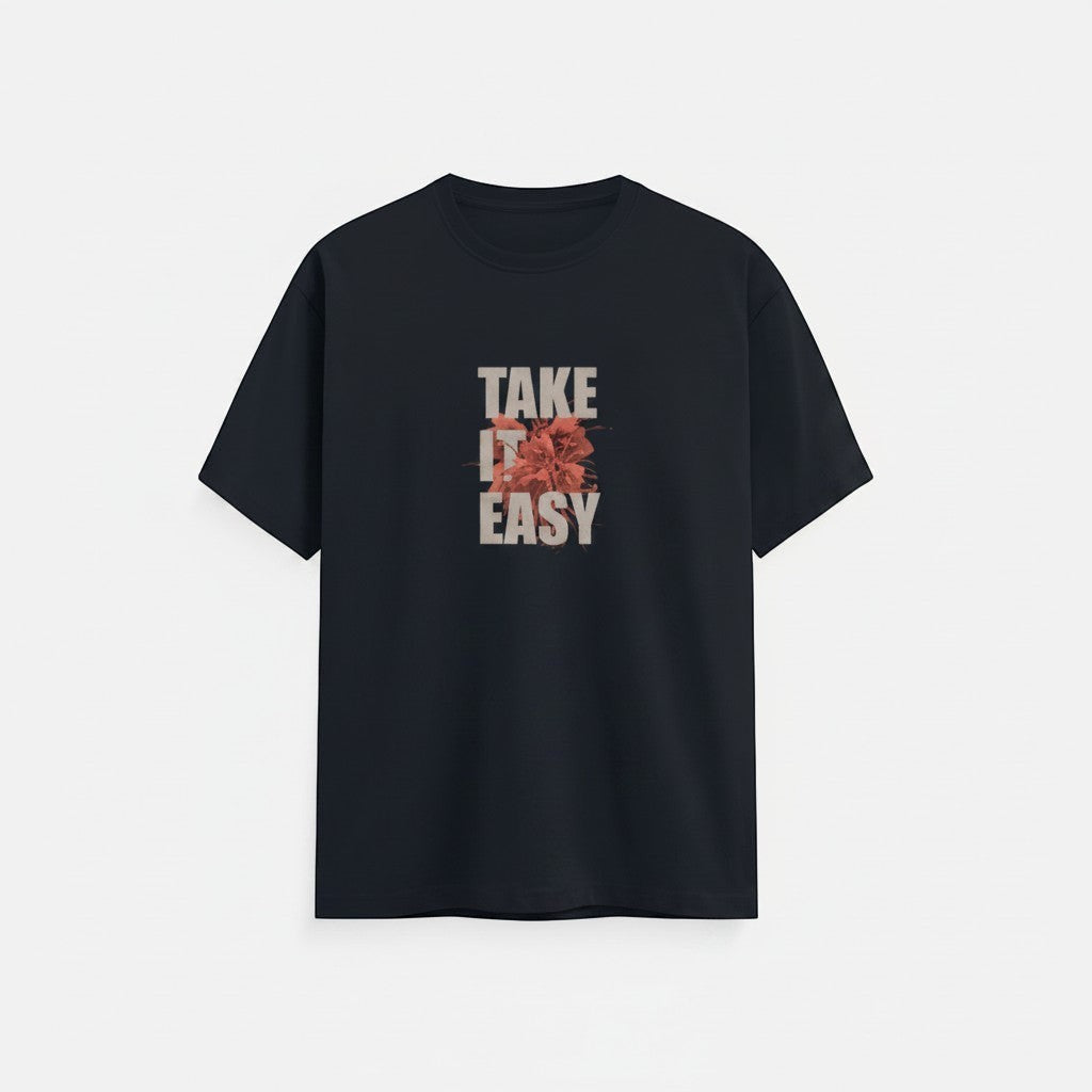No Cap Co black 100% cotton t-shirt with a minimalist 'TAKE IT EASY' graphic print featuring a floral design.