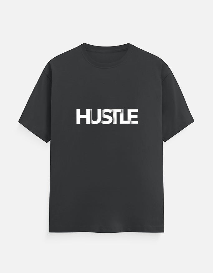 No Cap Co black 100% cotton unisex regular fit t-shirt with white 'HUSTLE' text graphic.