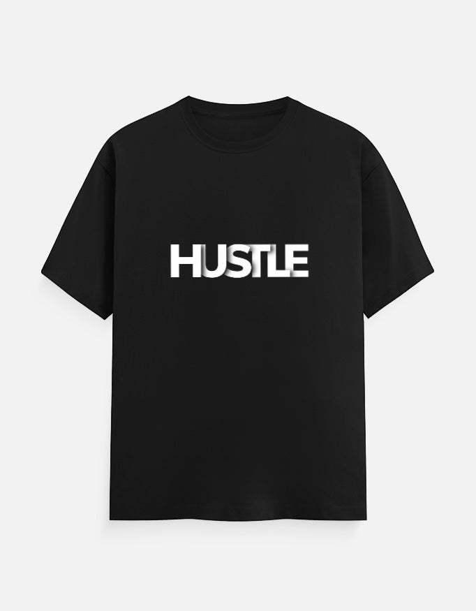 No Cap Co black 100% cotton unisex regular fit t-shirt with bold white 'HUSTLE' text graphic.