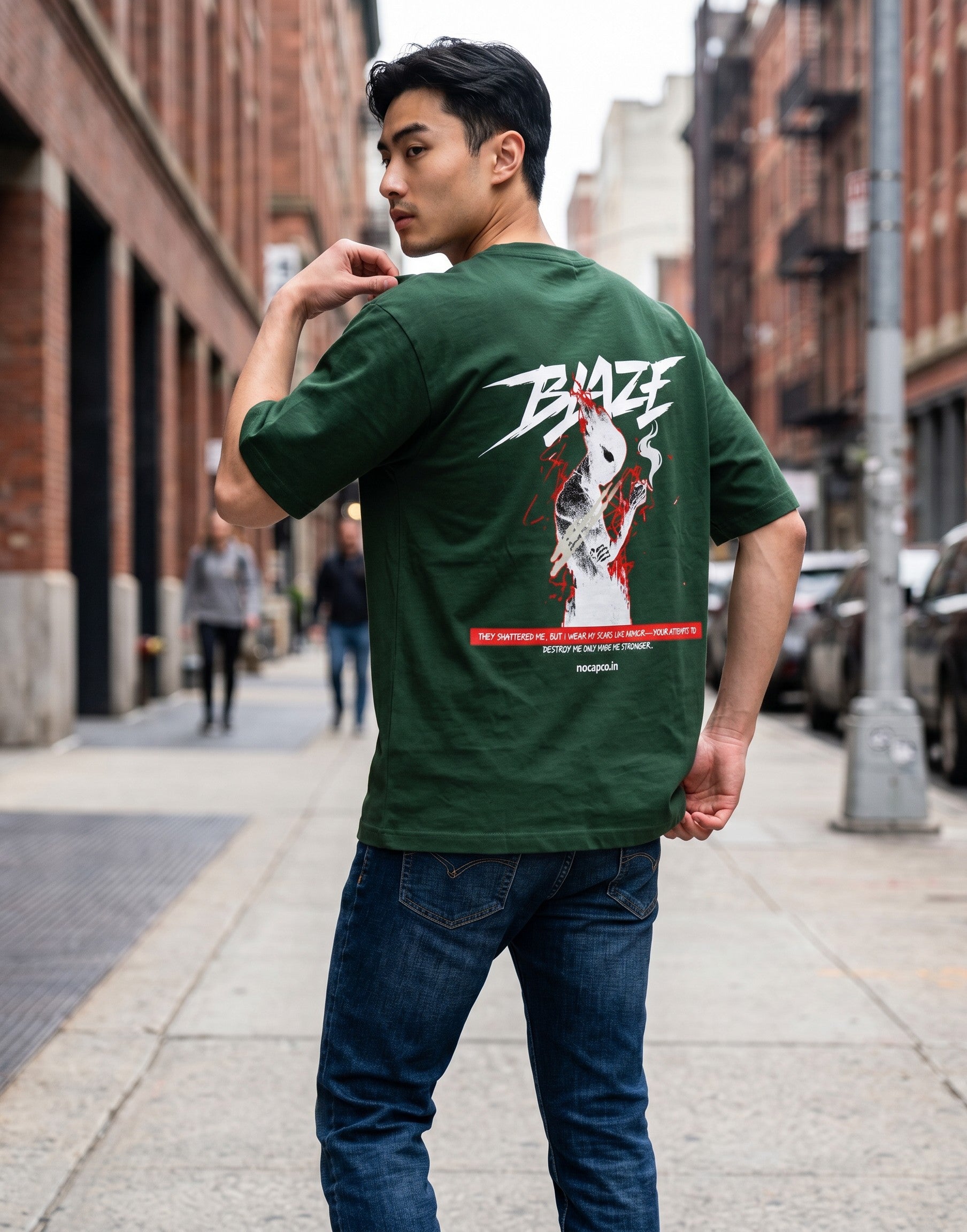 No Cap Co green 100% cotton oversized t-shirt with a graphic print of a figure and the word BLAZE.