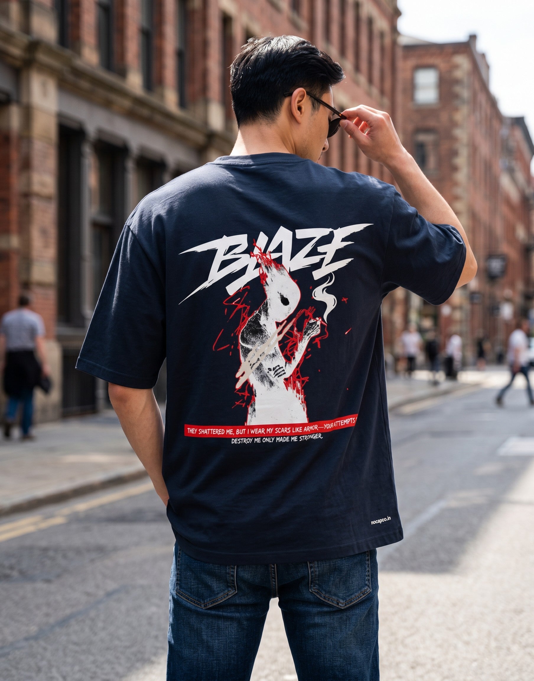No Cap Co navy blue 100% cotton oversized t-shirt with a graphic print of a figure and the word BLAZE.