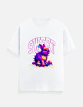 No Cap Co white 100% cotton crew neck t-shirt with a graphic print of a purple bunny wearing a spiked collar and a blue tag.