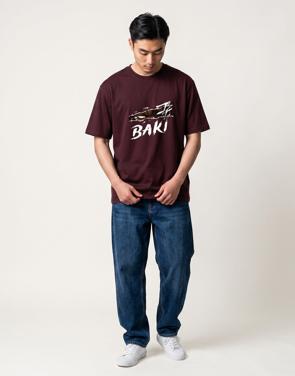 No Cap Co burgundy 100% cotton t-shirt with a ripped graphic design and the word BAKI in white.