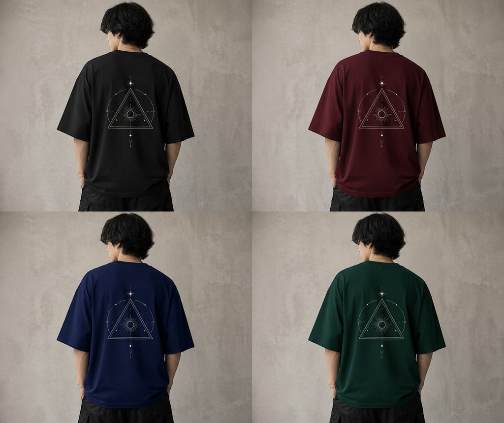 No Cap Co oversized cotton t-shirt in black, maroon, navy, and green, featuring a celestial triangle graphic on the back.