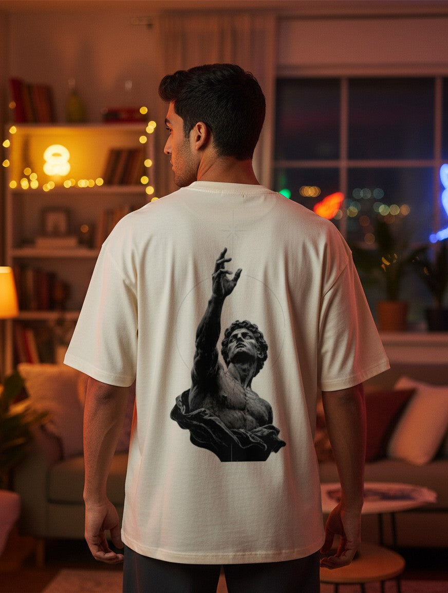 No Cap Co cream oversized fit t-shirt with a graphic print of a classical statue reaching upwards.
