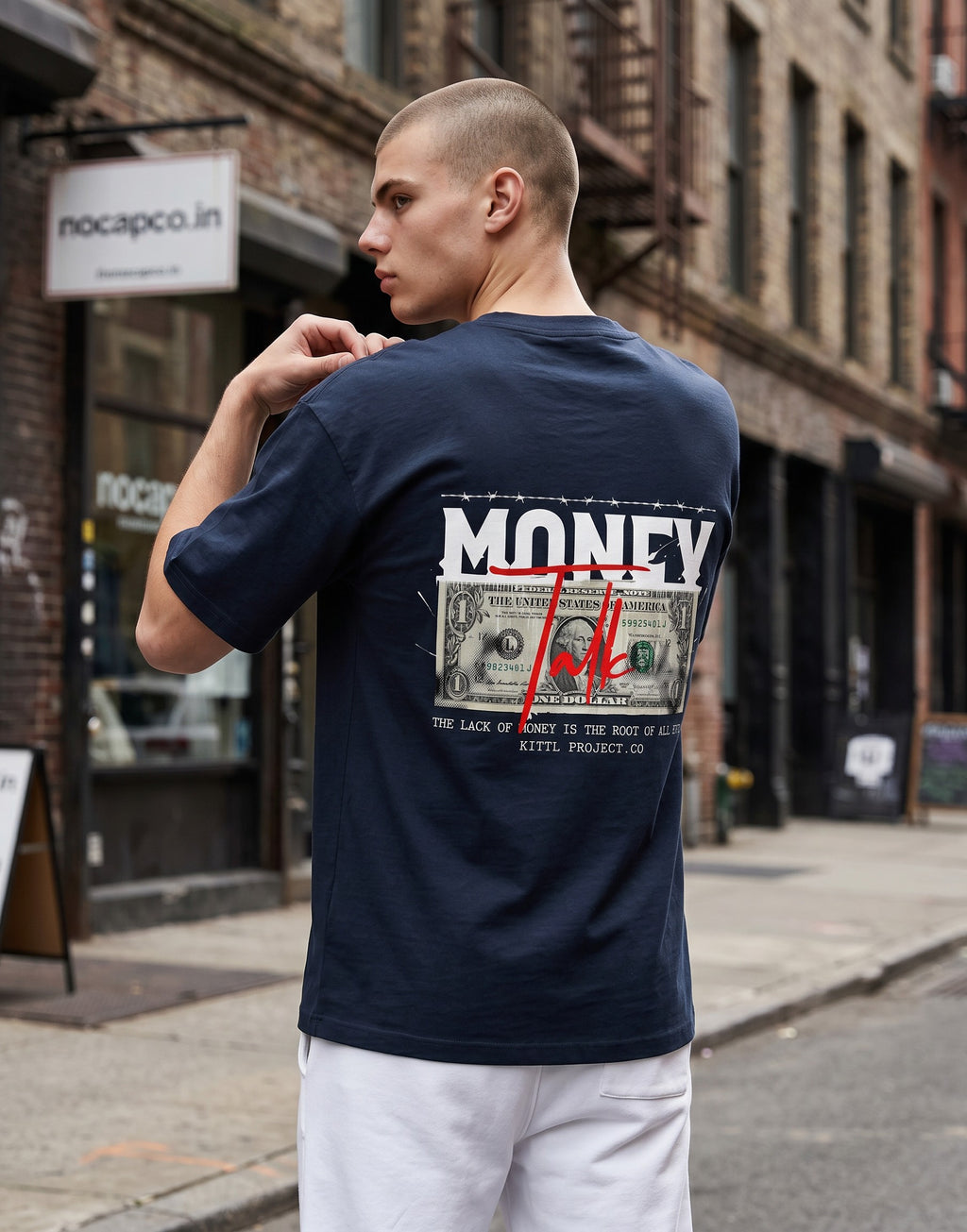 No Cap Co dark navy oversized t-shirt with a graphic print of a US dollar bill and the word MONEY.