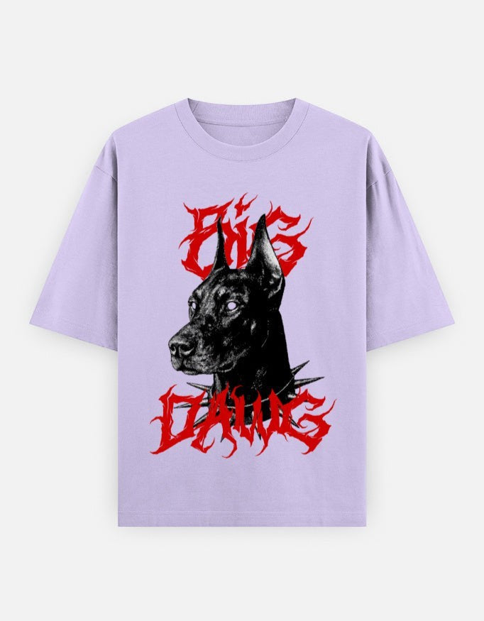 No Cap Co oversized lilac t-shirt with a graphic of a black Doberman wearing a spiked collar and red gothic text.