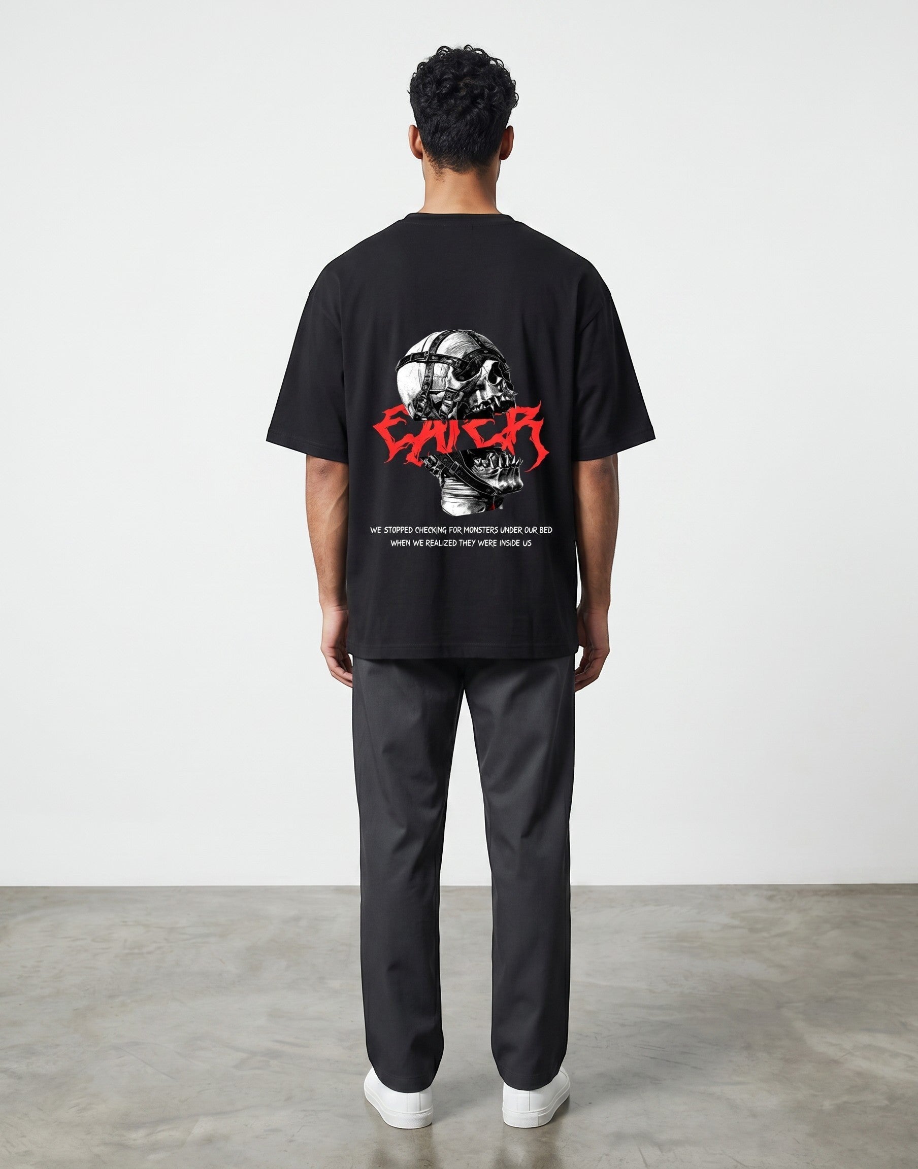 No Cap Co black oversized 100% cotton t-shirt with a graphic of a skull in a muzzle and red text.