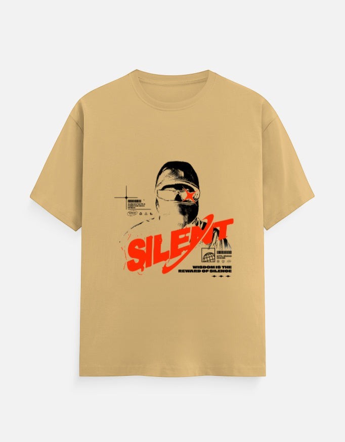 No Cap Co tan 100% cotton crew neck t-shirt with a graphic print of a person wearing a mask and sunglasses, and the word "SILENT" in red.
