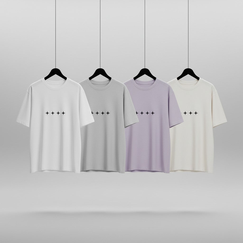 No Cap Co white oversized cotton t-shirt with four black star graphic print on chest.