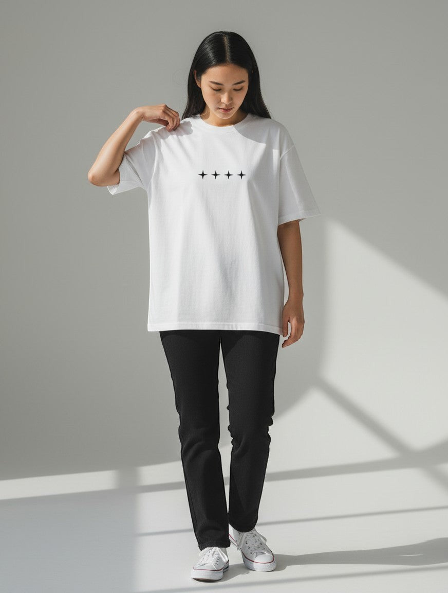 No Cap Co white oversized t-shirt with four black star graphic print on the chest. Premium 240 GSM cotton-polyester blend.